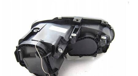 Lampa lewa reflektor black do vw touran caddy